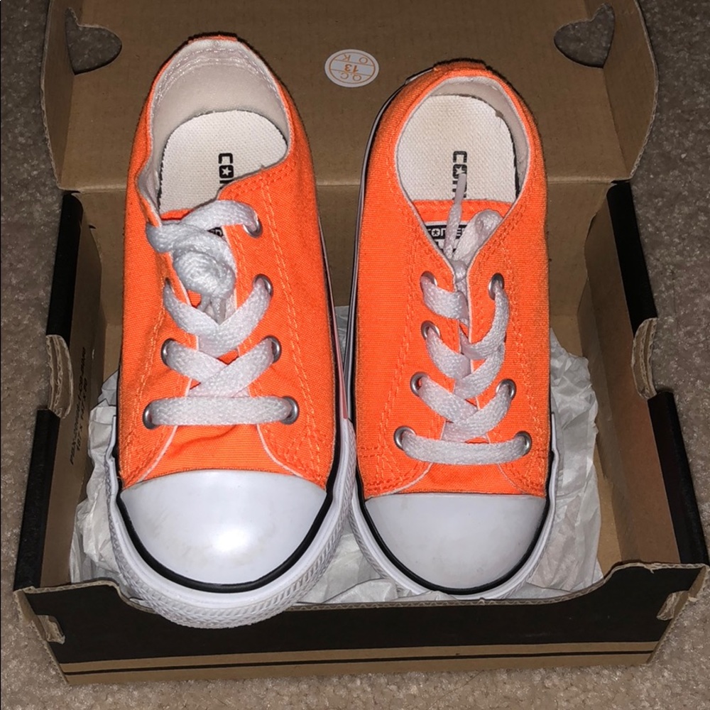 Neon orange converse